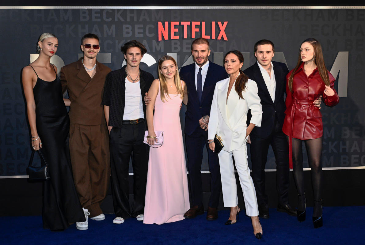 Romeo Beckham's ex-girlfriend Mia Regan, Romeo Beckham, Cruz Beckahm, Harper Beckham, David Beckham, Victoria Beckham, Brooklyn Peltz Beckham and Nicola Peltz Beckham at the UK premiere of David's Netflix documentary in 2023. Photo by Gareth Cattermole on Getty Images