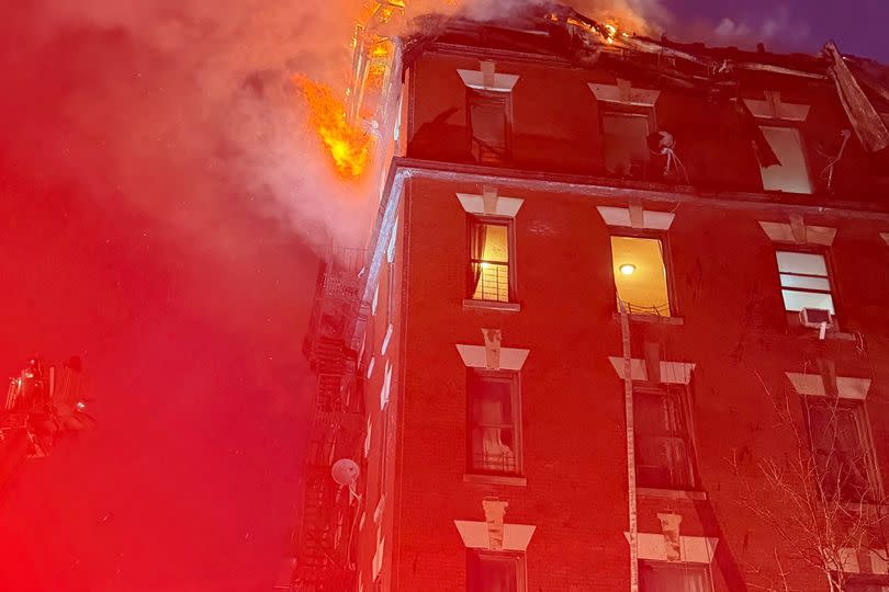 fire pouring out of windows bronx building fire