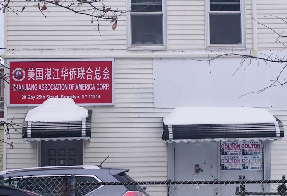 The 501(c)(3) Zhanjiang Association of America shares a building with the United Progressive Democratic Club, seen here with posters for Assemblyman Colton on the door. The Times Union found nonprofit leaders in the club taking down campaign posters during a recent visit. (Emilie Munson/Times Union)