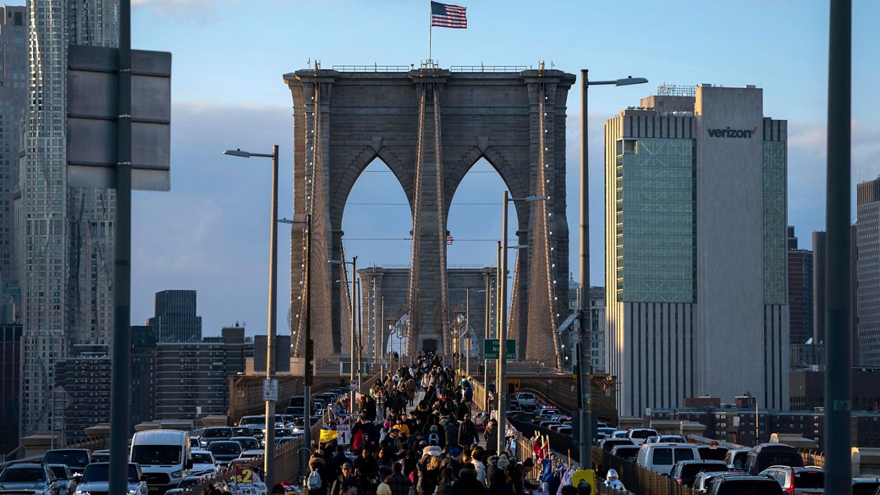 The Brooklyn Bridge is set to get separate entrances for cyclists and pedestrians at the Manhattan side. (AP Photo/Julia Nikhinson, File)