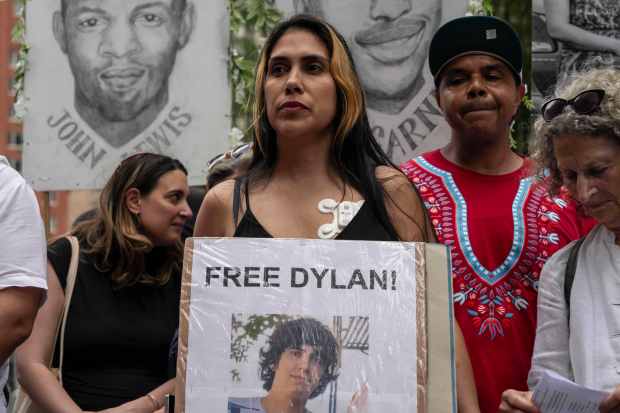 Raiza, mother of Dylan Lopez Contreras, first public high school student detained by federal agents, attends a press conference outside the Jacob K. Javits federal building, Thursday, July 17, 2025, in New York. (AP Photo/Yuki Iwamura)