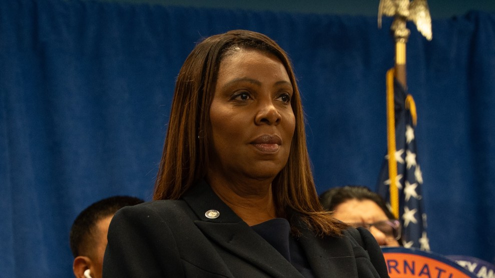 Letitia James, a Black woman, looking somber at a press conference