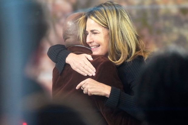 Savannah Guthrie hugs Al Roker during a visit to the Today show at Rockefeller Plaza in New York on Thursday, March 5, 2026. (Photo by Charles Sykes/Invision/AP)
