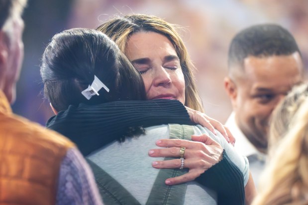 Savannah Guthrie hugs a staff member during a visit to the Today show at Rockefeller Plaza on Thursday, March 5, 2026, in New York. (Photo by Charles Sykes/Invision/AP)