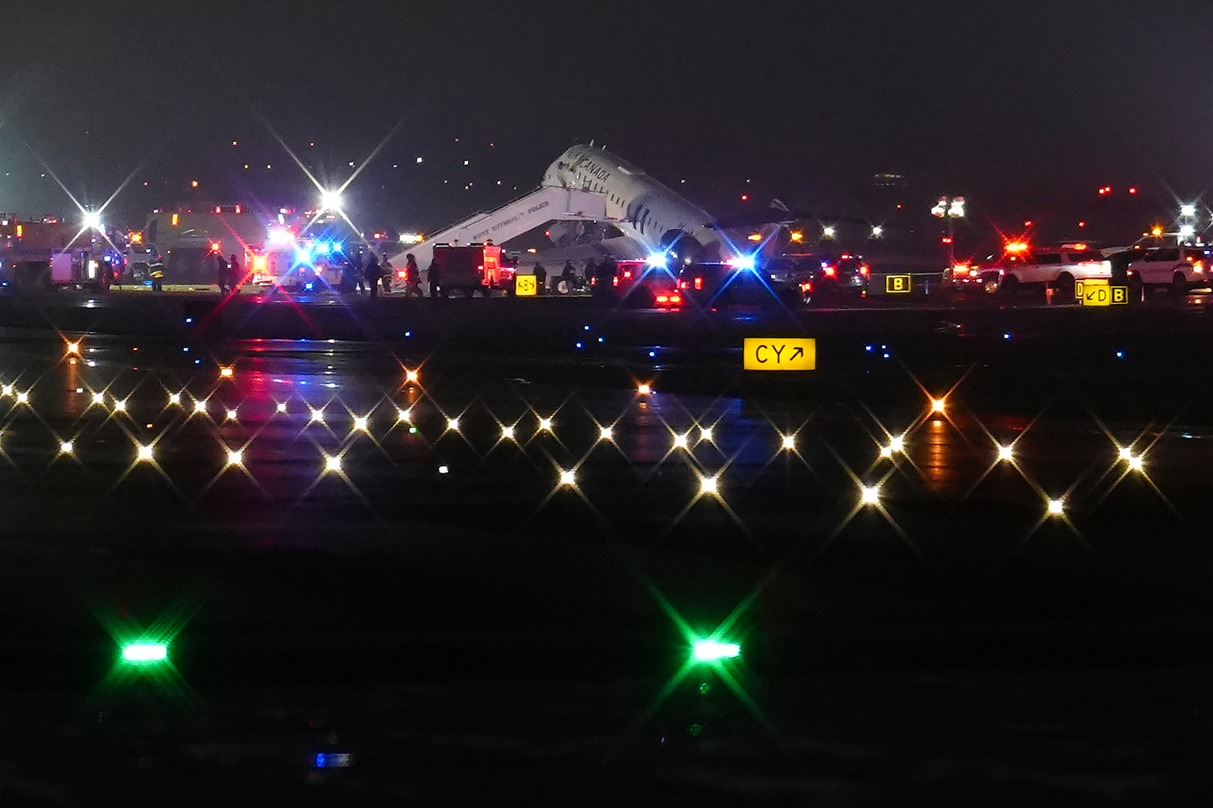 An Air Canada Jet sits on the runway at LaGuardia...