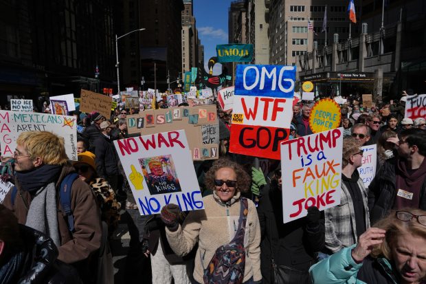 People take part in a "No Kings" protest Saturday, March 28, 2026, in New York. (AP Photo/Adam Gray)