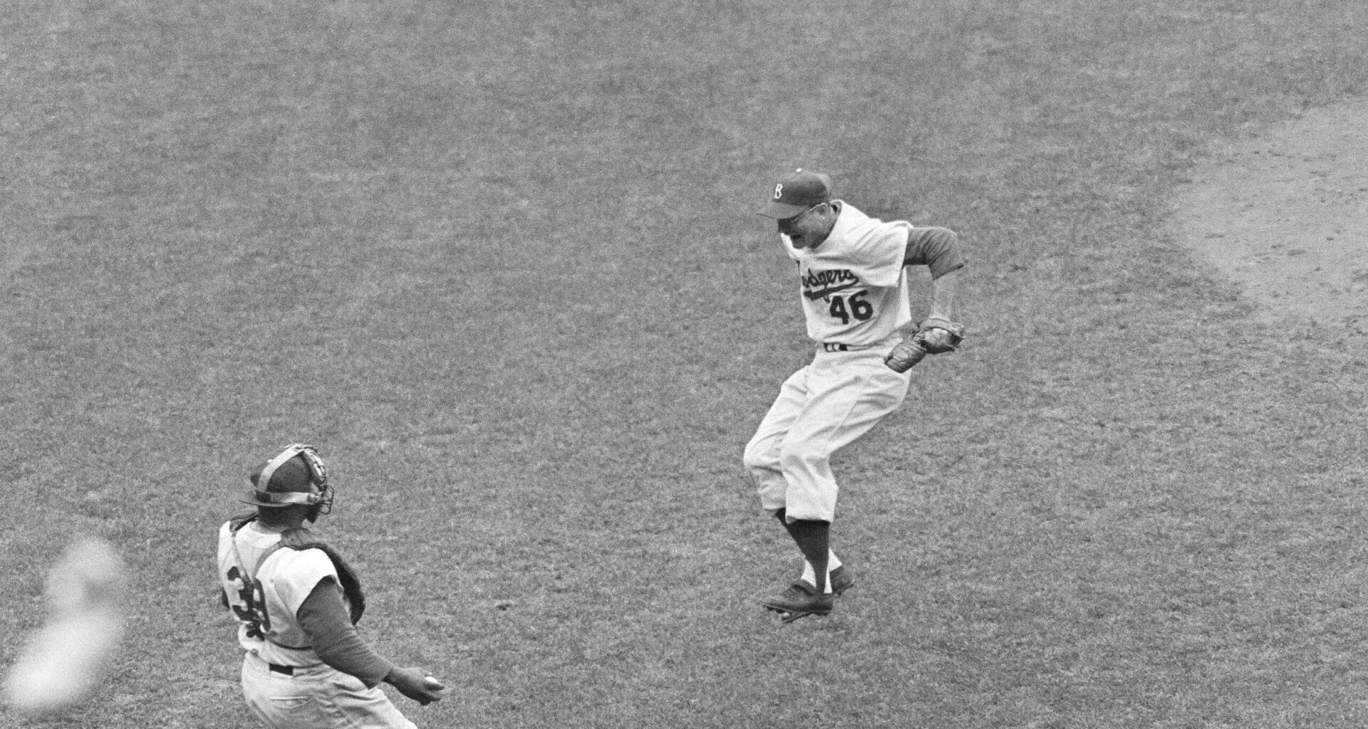Brooklyn Dodgers relief pitcher Don Bessent runs toward the arms of catcher Roy Campanella immediately after finish of the final game of the season with Pittsburgh at Ebbets Field in Brooklyn, New York, Sept. 30, 1956. Brooklyn's victory gave the Dodgers their fourth National League pennant in five years. Don came into the game in relief of starter Don Newcombe, who was credited with his 27th victory of the season as the Dodgers beat the Pirates, 8-6. Photo: Harry Harris/AP