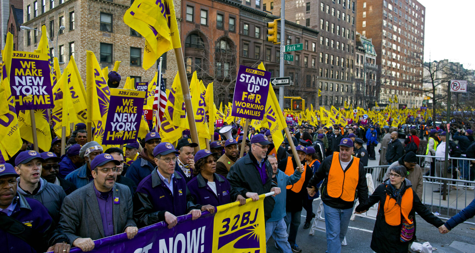 FILE- In this April 2, 2014 file photo, union and non-union apartment building workers march during a protest and march for a fair contract in New York. On Friday, April 11, 2014, the union representing doormen and other New York City building workers has reached a tentative contract agreement with property owners. The deal announced Friday by Local 32BJ of the Service Employees Union and the Realty Advisory Board on Labor Relations will provide raises of 11.3 percent over four years.  (AP Photo/Craig Ruttle, File)
