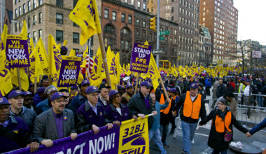 FILE- In this April 2, 2014 file photo, union and non-union apartment building workers march during a protest and march for a fair contract in New York. On Friday, April 11, 2014, the union representing doormen and other New York City building workers has reached a tentative contract agreement with property owners. The deal announced Friday by Local 32BJ of the Service Employees Union and the Realty Advisory Board on Labor Relations will provide raises of 11.3 percent over four years.  (AP Photo/Craig Ruttle, File)