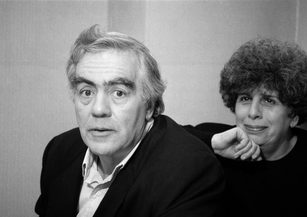 Pulitzer Prize-winner and New York Daily News columnist Jimmy Breslin is pictured with his wife, Ronnie Eldridge, at their home in New York City in January 1989. (AP Photo/Mario Suriani)