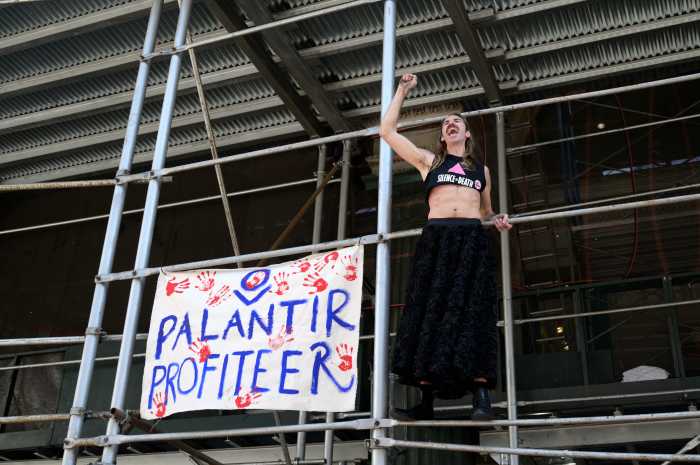 Calling out Palantir's ties to Immigration and Customs Enforcement (ICE).