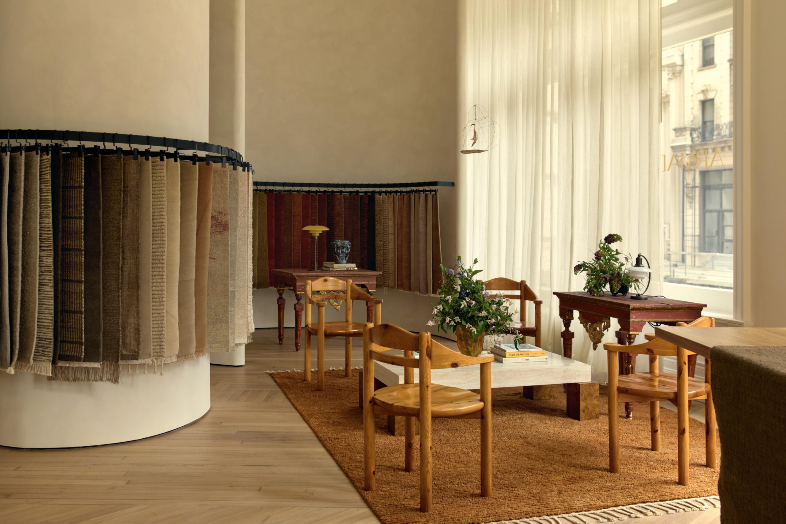 Rugs and curated furniture are displayed at the Armadillo flagship store