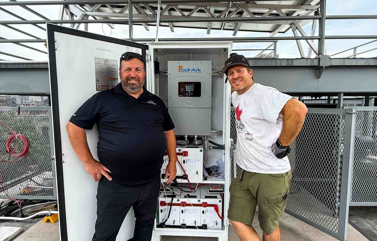 Brooklyn SolarWorks and Briggs and Stratton officials near the new NYC BESS project