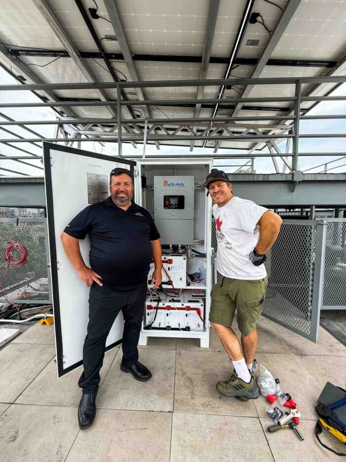 Brooklyn SolarWorks and Briggs and Stratton officials near the new NYC BESS project