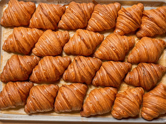 Image may contain: Croissant, Food, Meat, Pork, and Bread