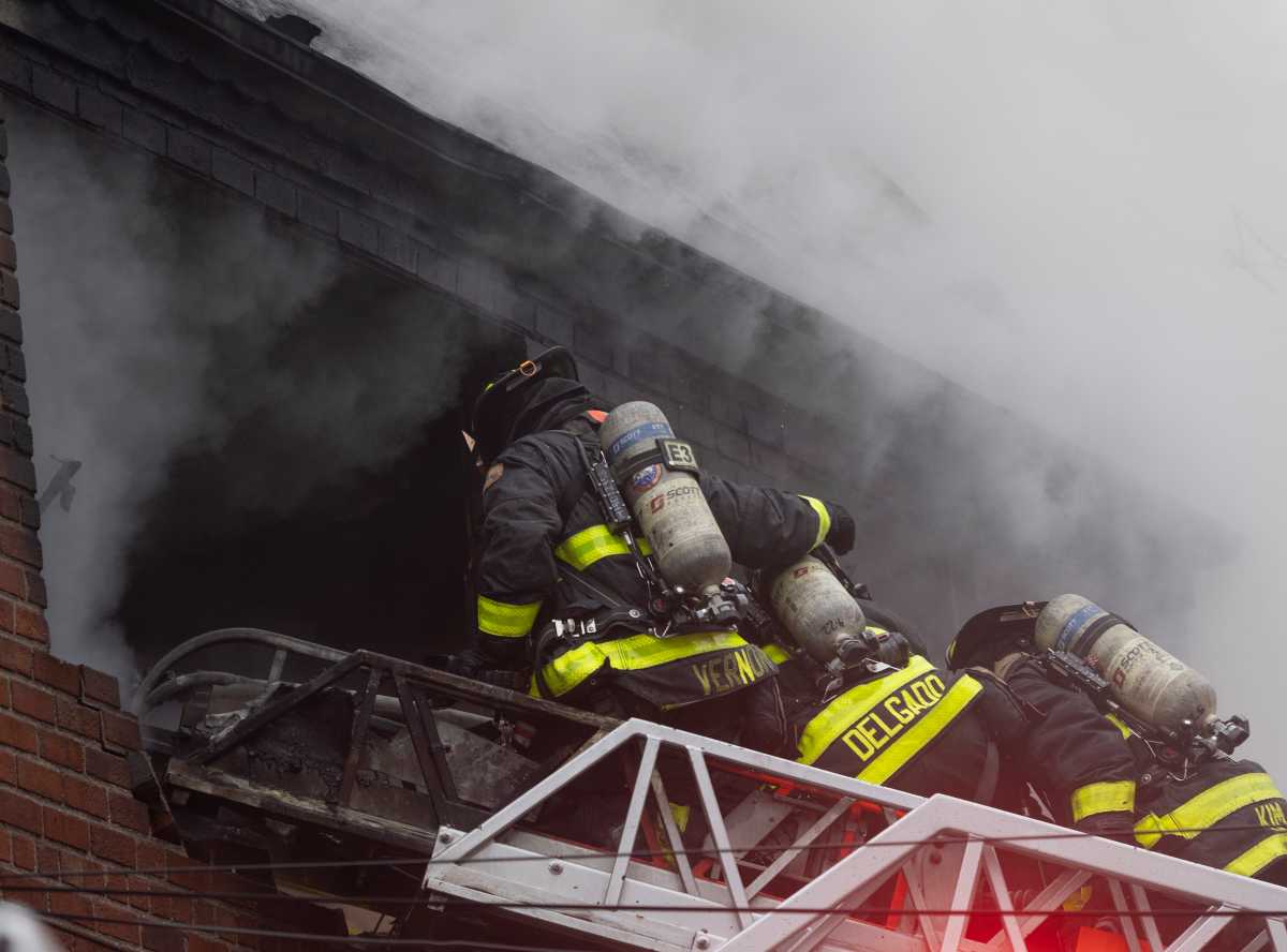 Three dead after four-alarm fire rips through a multi-family Queens home