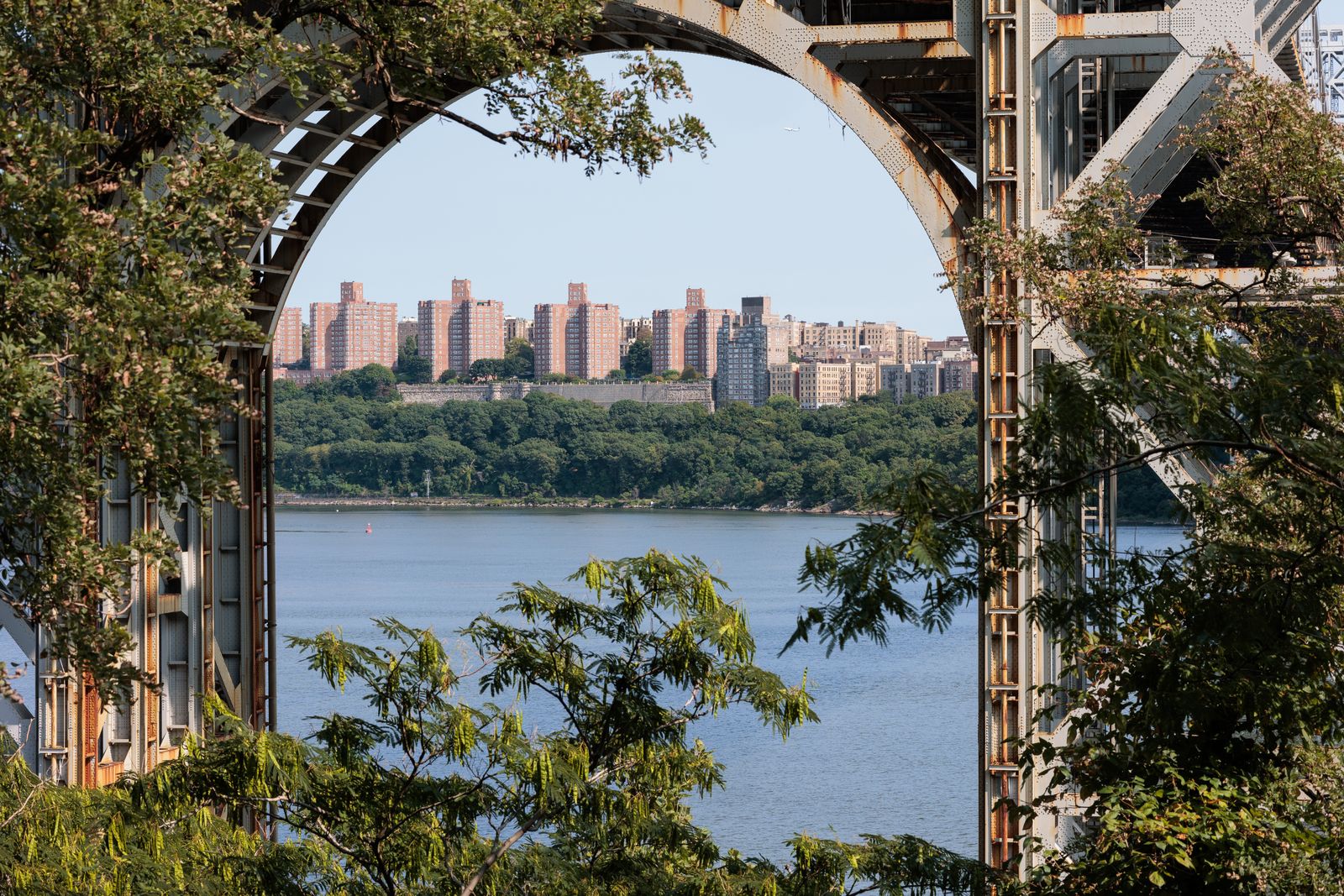 Image may contain City Architecture Building Cityscape Urban Nature Outdoors Scenery Arch High Rise and Water