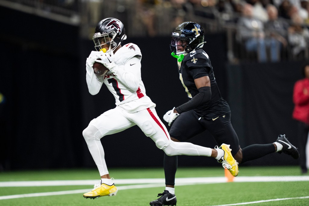 Darnell Mooney #1 of the Atlanta Falcons makes a catch during an NFL football game against the New Orleans Saints at Caesars Superdome on November 23, 2025 in New Orleans, Louisiana.