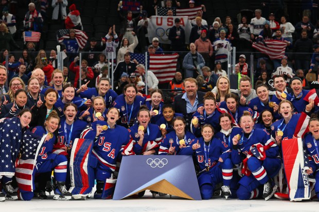 Gold medalist Team United States pose after the medal ceremony for the Ice Hockey Women following the Women's Gold Medal match between the United States and Canada on day 13 of the Milano Cortina 2026 Winter Olympic games at Milano Santagiulia Ice Hockey Arena on February 19, 2026 in Milan, Italy. (Photo by Bruce Bennett/Getty Images)