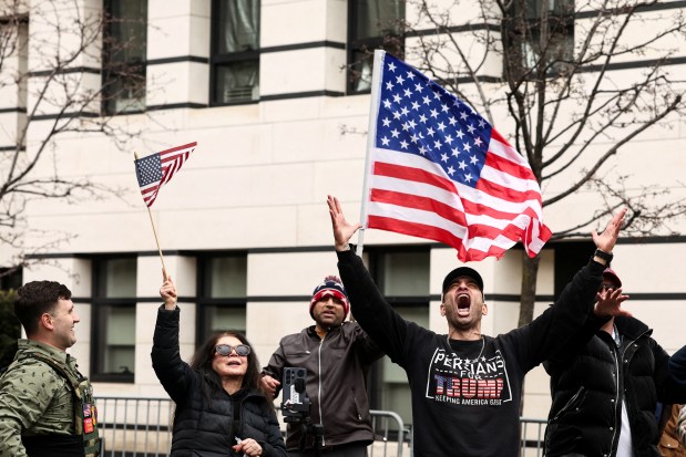 Far-right influencer Jake Lang (L) and supporters arrive at a protest he organized against alleged "Islamification" and to ask for a "stop of public Muslim prayer" in New York, in front of Gracie Mansion, New York mayor Zohran Mamdani's official residence, in New York on March 7, 2026. (Photo by CHARLY TRIBALLEAU / AFP via Getty Images)