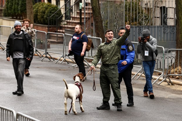 Far-right influencer Jake Lang holds a goat on a leash as he arrives at a protest organized by Lang against alleged "Islamification" and to ask for a "stop of public Muslim prayer" in New York, in front of Gracie Mansion, New York mayor Zohran Mamdani's official residence, in New York on March 7, 2026. (Photo by CHARLY TRIBALLEAU / AFP via Getty Images)