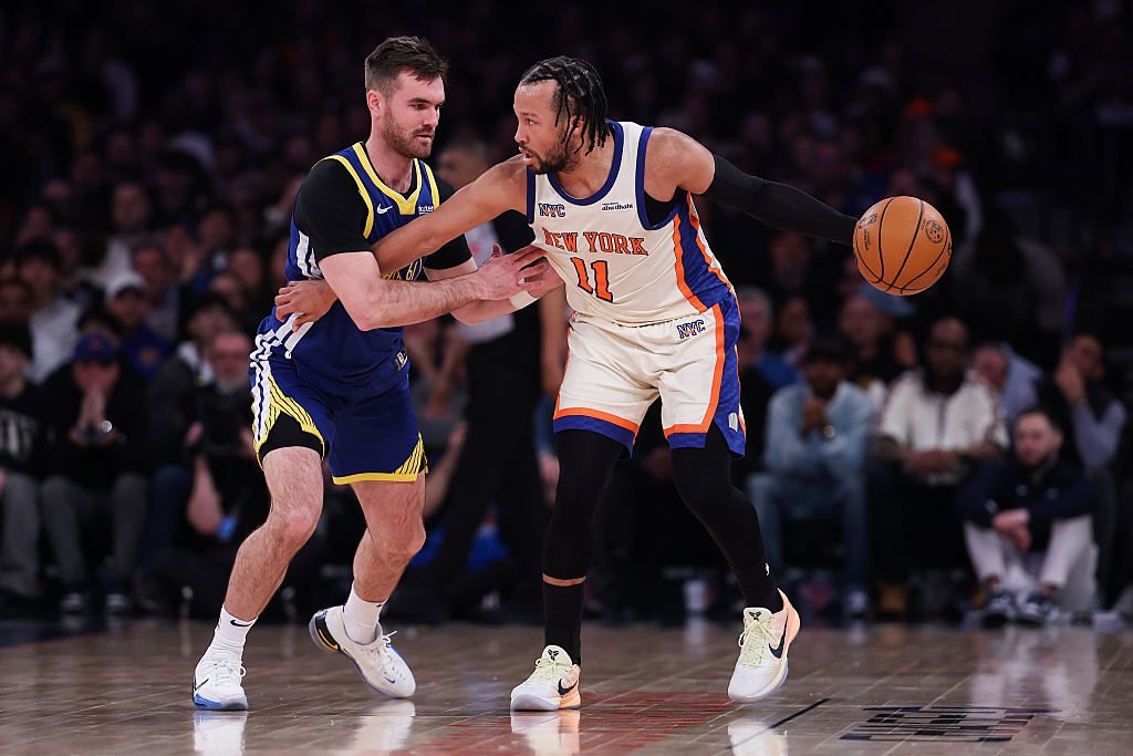 NEW YORK, NEW YORK - MARCH 15: Jalen Brunson #11 of the New York Knicks is guarded by Pat Spencer #61 of the Golden State Warriors during the first quarter of the game at Madison Square Garden on March 15, 2026 in New York City. NOTE TO USER: User expressly acknowledges and agrees that, by downloading and or using this photograph, user is consenting to the terms and conditions of the Getty Images License Agreement. (Photo by Dustin Satloff/Getty Images)