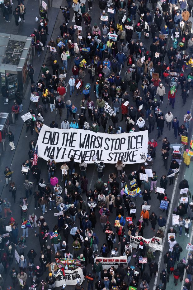 Protesters participate in the "No Kings" national day of protest in New York on March 28, 2026. Nationwide protests against US President Donald Trump are expected Saturday as millions of people vent fury over what they see as his authoritarian bent and other forms of cruel, law-trampling governance. It is the third time in less than a year that Americans will take to the streets as part of a grassroots movement called "No Kings," the most vocal and visual conduit for opposition to Trump since he began his second term in January 2025. (Photo by CHARLY TRIBALLEAU / AFP via Getty Images)
