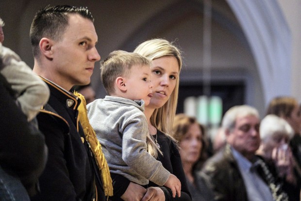 Jonathan Diller's wife, Stephanie, and son, Ryan, are pictured during the first anniversary memorial mass for NYPD Detective First Grade Jonathan Diller at St. Agnes Cathedral in Rockville Centre, New York, on Tuesday, March 25, 2025. (NYPD)