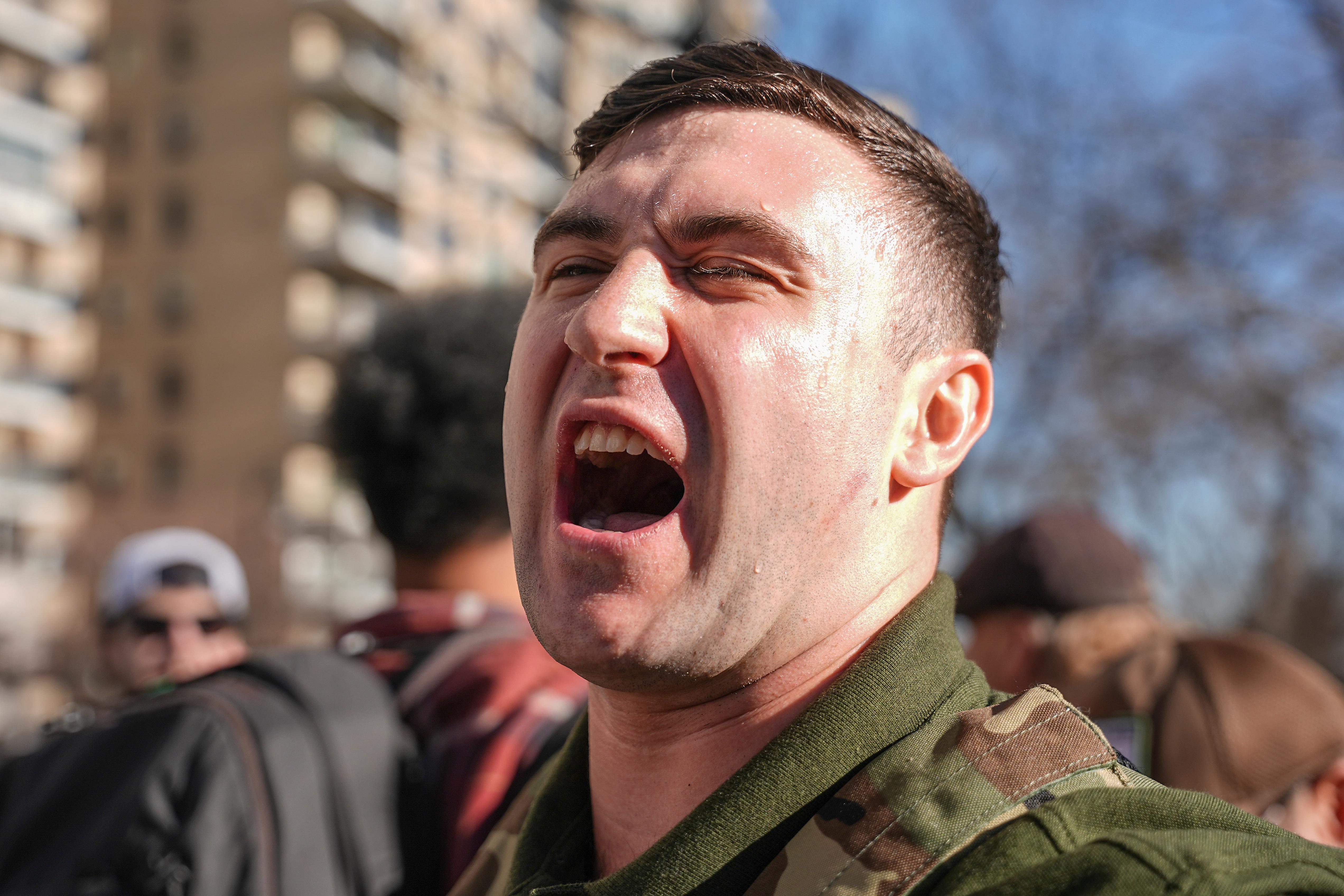 Jake Lang demonstrates outside Gracie Mansion after a news conference...