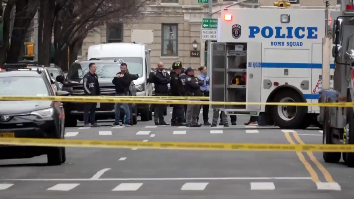 In this image taken from video, law enforcement officers respond to Manhattan's Upper East Side as ...