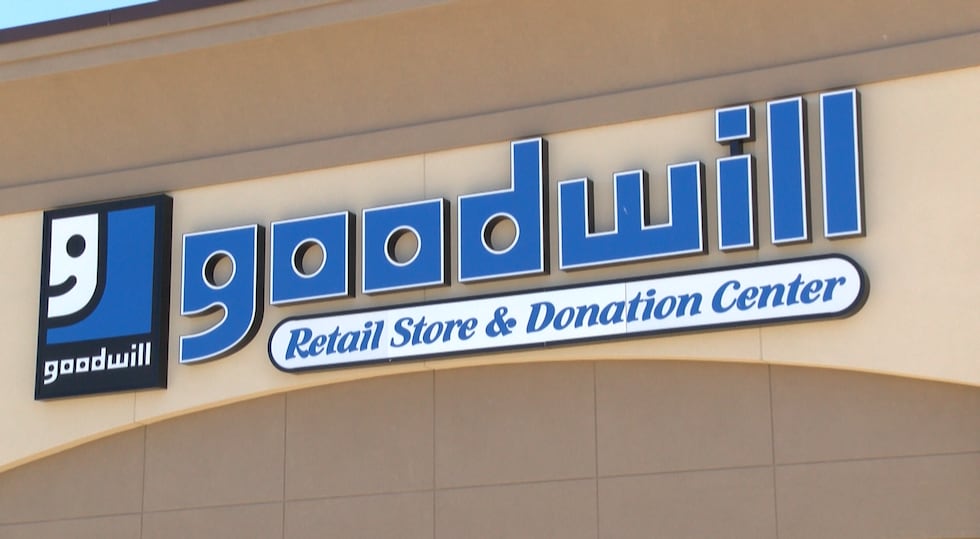 A Manhattan Goodwill store was scammed out of more than $1,000, officials said Wednesday morning.