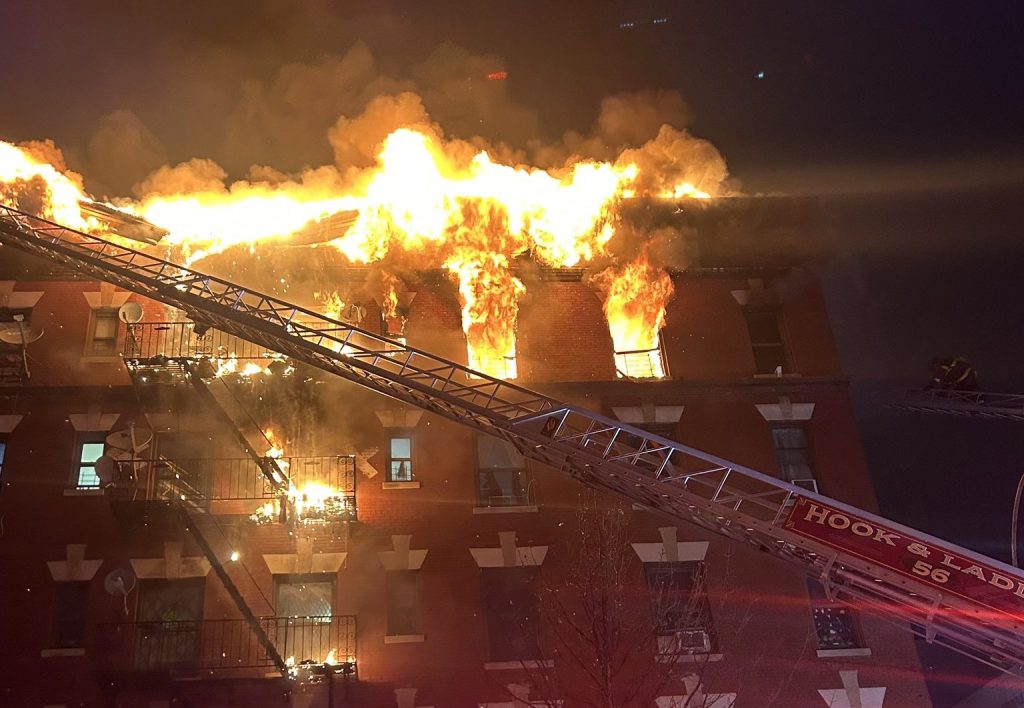 Man dead as massive fire tears through Bronx apartment building