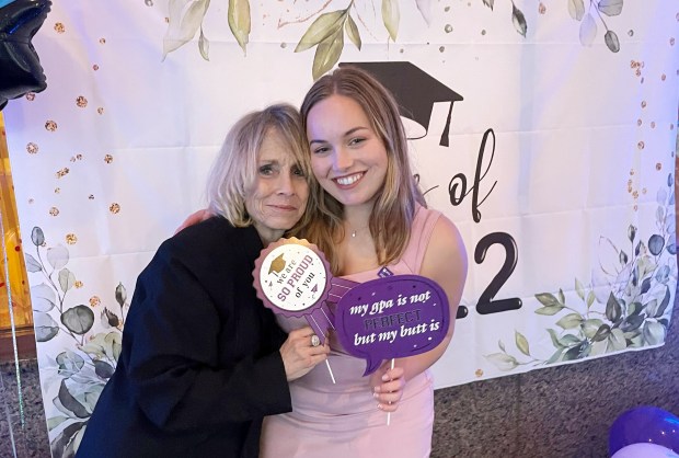 Suzanne Schmieder is pictured with her daughter, Sydney Schmieder, at Sydney's NYU Tisch graduation party in 2022.