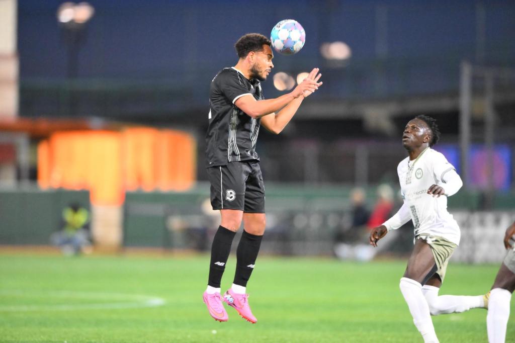 Brooklyn FC defender Thomas Vancaeyezeele jumps to head the ball during a match against Hartford Athletic at Maimonides Park.