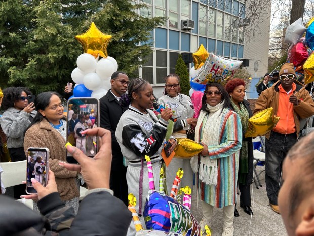 Julani Bannister, 21, sister of Ka'mardre Coleman, speaks at a vigil outside Sheepshead Bay High School in Brooklyn on Friday, March 27, 2026.