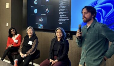 Brennan LaBrie speaks to a room of journalists about workshopping pitching