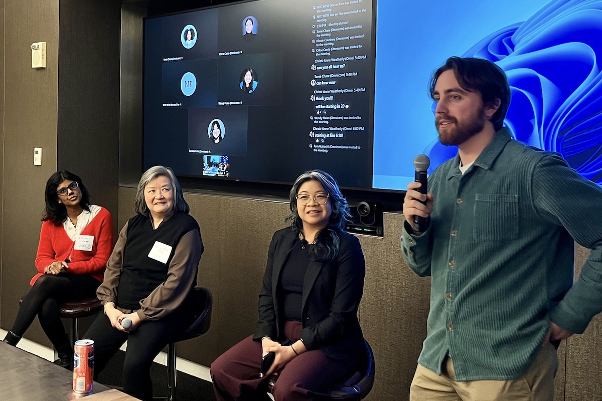 Brennan LaBrie speaks to a room of journalists about workshopping pitching