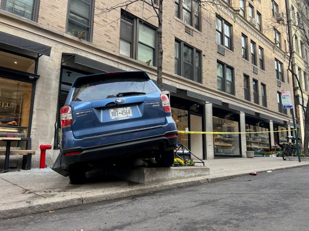 A vehicle is pictured after it crashed into a building on Madison Ave. near E. 90th St. in Manhattan on Tuesday, March 31, 2026. (Barry Williams / New York Daily News)