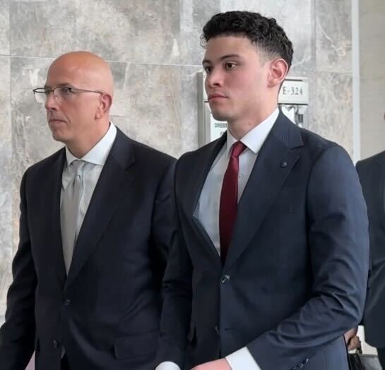 NYPD Officer Justin Colon (right) is pictured with his attorney at Queens Criminal Court on Monday, March 31, 2025. (Sheetal Banchariya / New York Daily News)