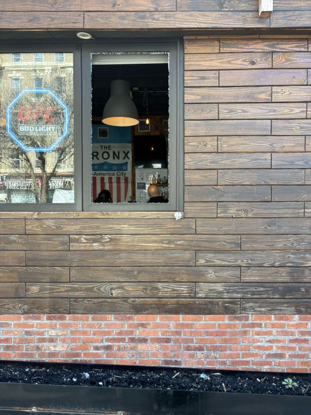At The Bronx Public, a restaurant across street, a bullet from the shooting shattered a window. (Roni Jacobson / New York Daily News)