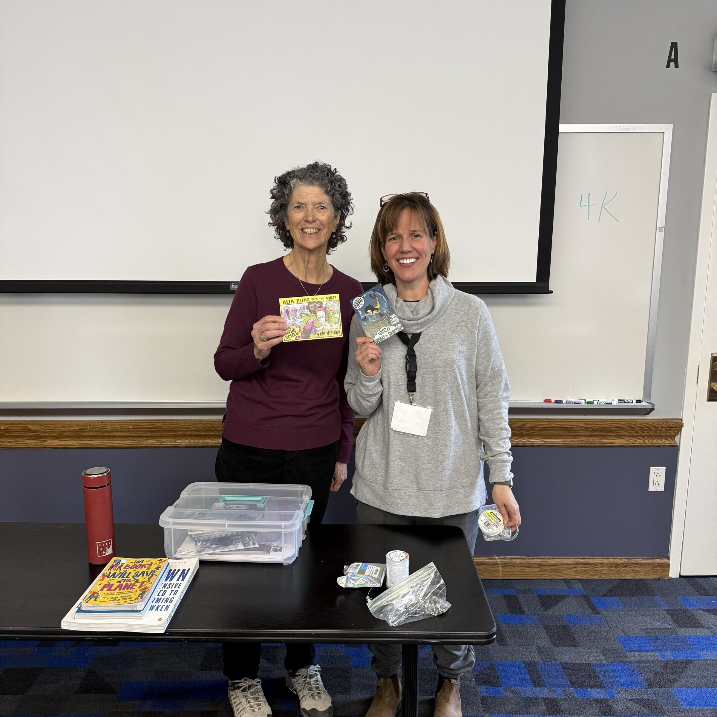 Margie Turrin and Sarah Slack pose during a presentation