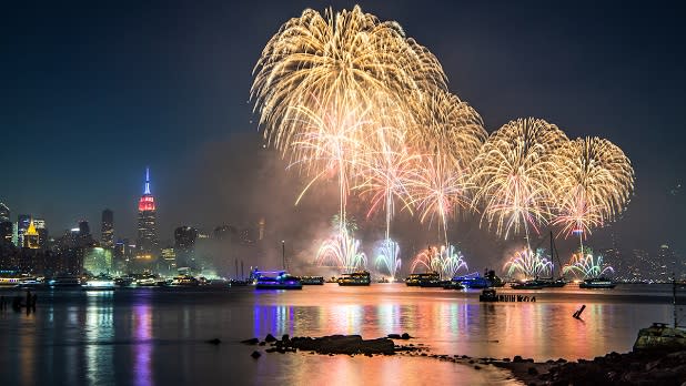 Fireworks burst from five barges in the East River for the 2021 Macy's 4th of July fireworks display in New York City