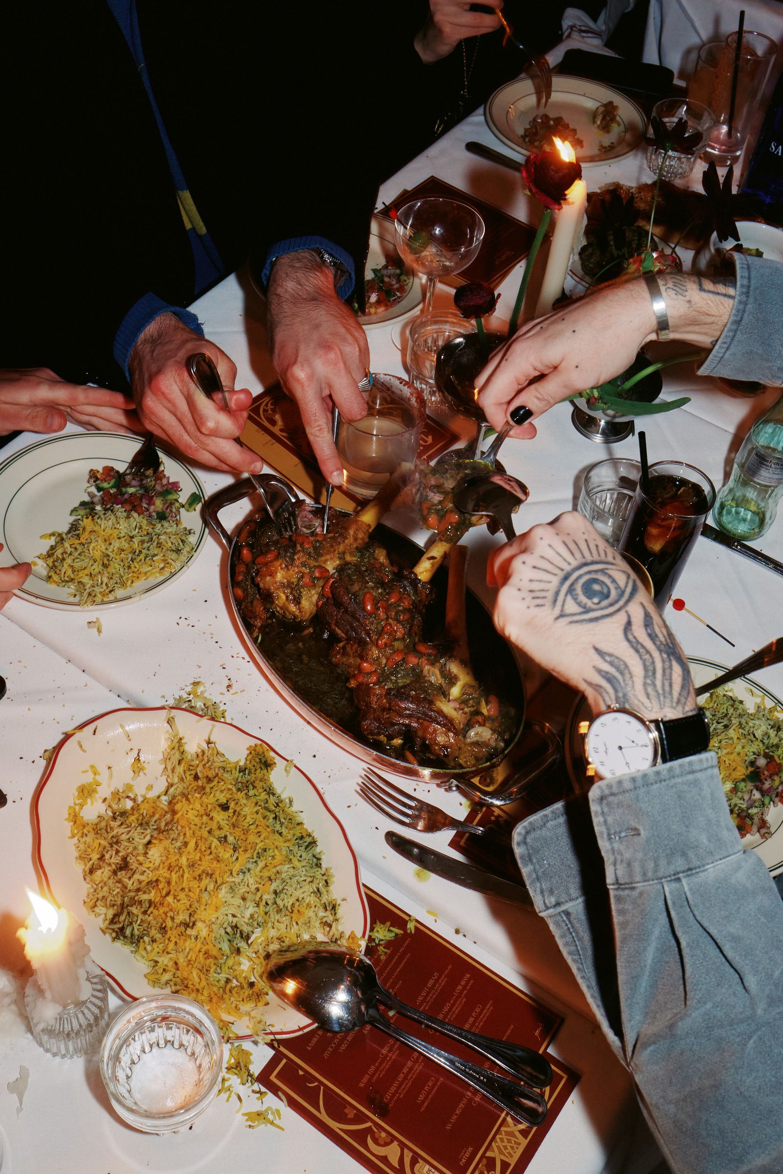 Image may contain Food Food Presentation Cutlery Meal Furniture Table Dinner Adult Person Dining Table and Meat