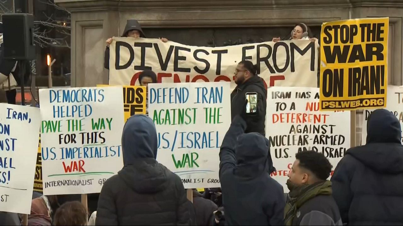 Protesters argue escalation risks widening the conflict. (Spectrum News NY1)