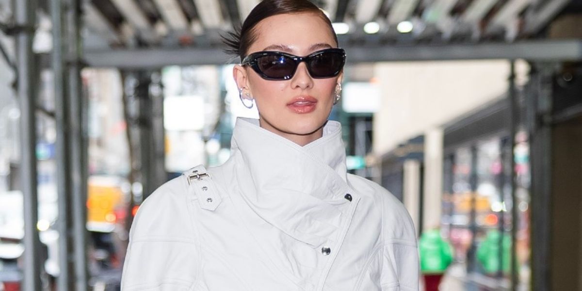 Lola Tung Struts Through NYC in Slingback Heels and a Sheer Lace Skirt