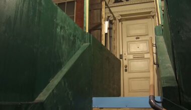 Supporters gathered inside the Merchant's House Museum Monday, urging the city's Landmarks Preservation Commission to reject a proposal to demolish a neighboring garage and build a new commercial building. (Spectrum News NY1)