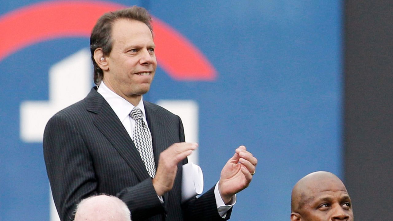 Mets radio announcer Howie Rose applauds during a Mets Hall of Fame induction ceremony at Citi Field in New York on Aug. 1, 2010. (AP Photo/Kathy Willens, File)