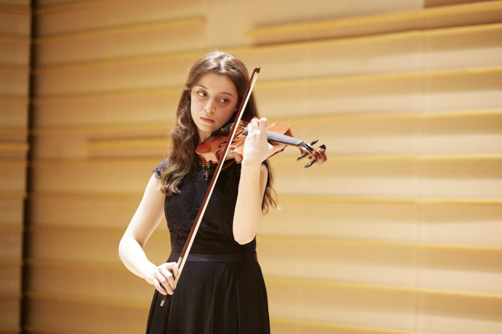 Glenda Peraj in 2024 before participating in a concert at Symphony Space, located on Broadway at West 95th Street, Manhattan. The photo was taken by Glenda's mother, Arta Peraj, in a hallway at the venue. Photo courtesy of Glenda Peraj