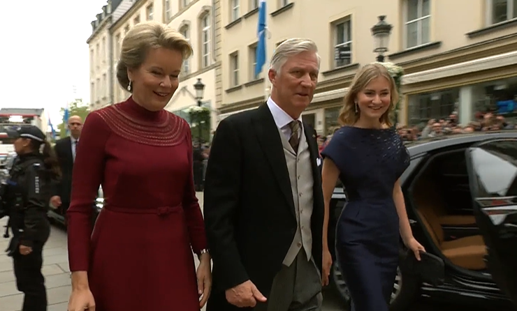 King Philippe and Queen Mathilde, who wears burgundy, arrive with Princess Elisabeth, in blue, for the abdication of Grand Duke Henri of Luxembourg