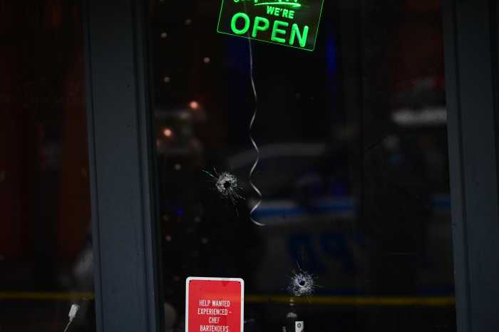 bullet hole at canarsie bar